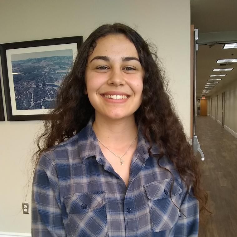 Portrait of Jordan Hisamoto, Senior Program Manager.